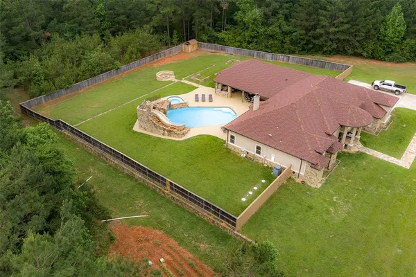 an aerial view of a pool