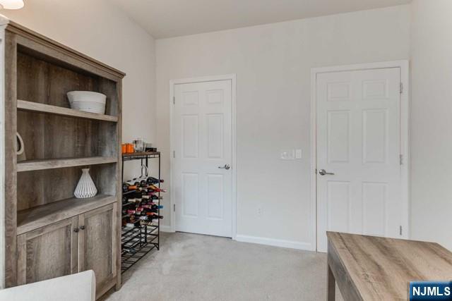 22 Veterans Drive Wood-Ridge, NJ 07075 - Photo 28 of 49 a view of walk in closet with clothes and shoes