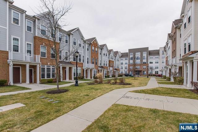22 Veterans Drive Wood-Ridge, NJ 07075 - Photo 3 of 49 a view of residential building with street view