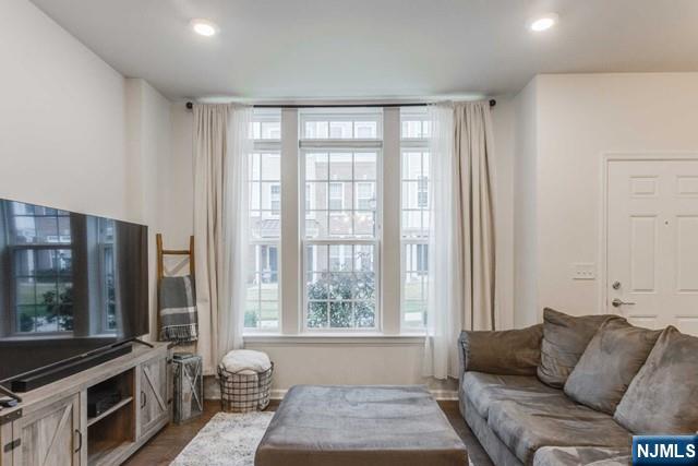 22 Veterans Drive Wood-Ridge, NJ 07075 - Photo 7 of 49 a living room with furniture and a window