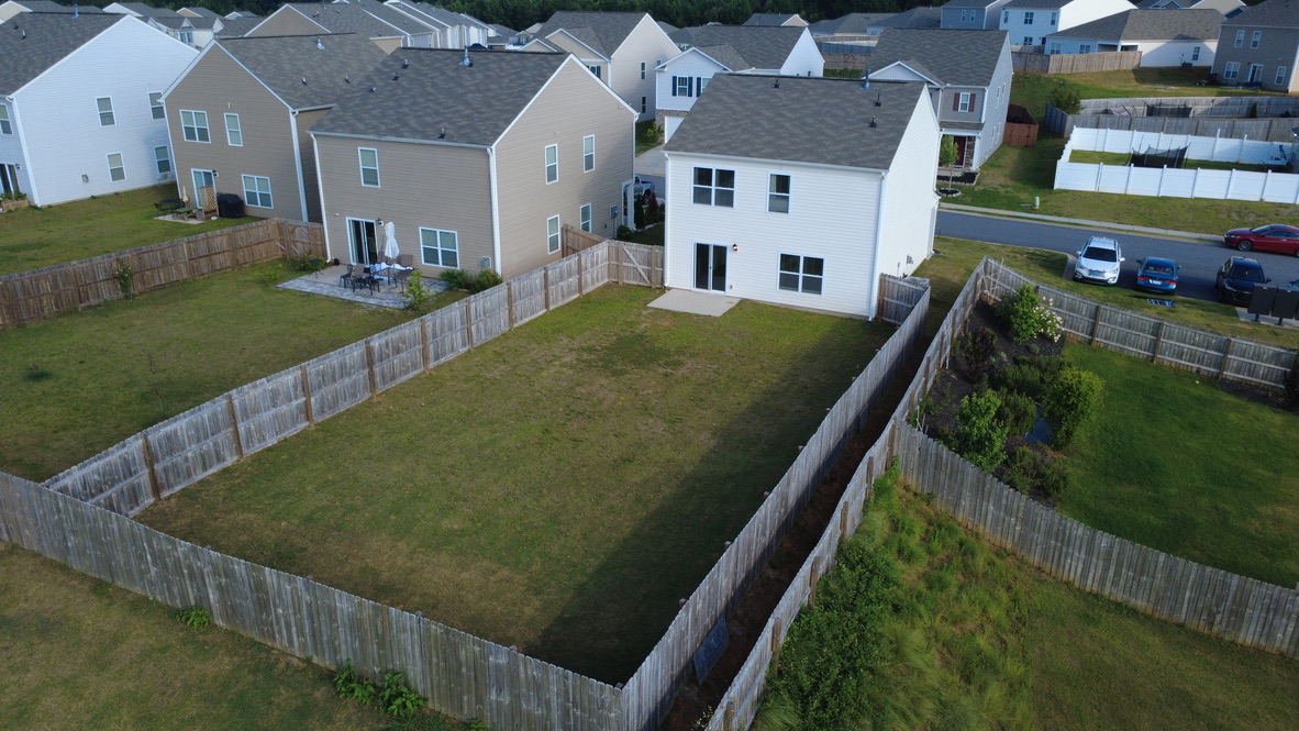 105 Rustic Rdg Drive Easley, SC 29640 - Photo 22 of 23 Fenced backyards offer private outdoor living space for each home in this residential community.