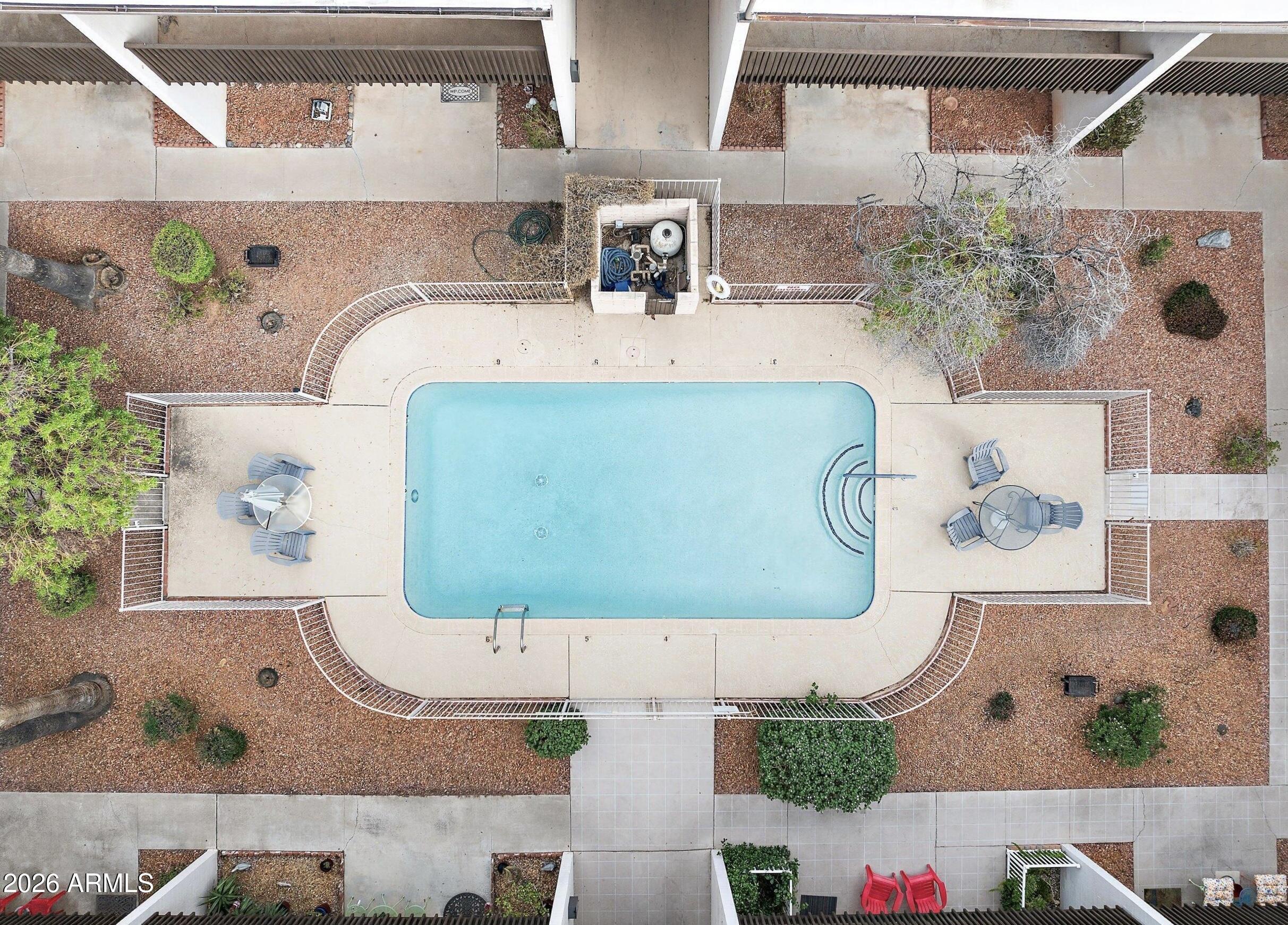 6565 North 19th Avenue, Unit 27 Phoenix, AZ 85015 - Photo 16 of 17 an aerial view of a house with a swimming pool
