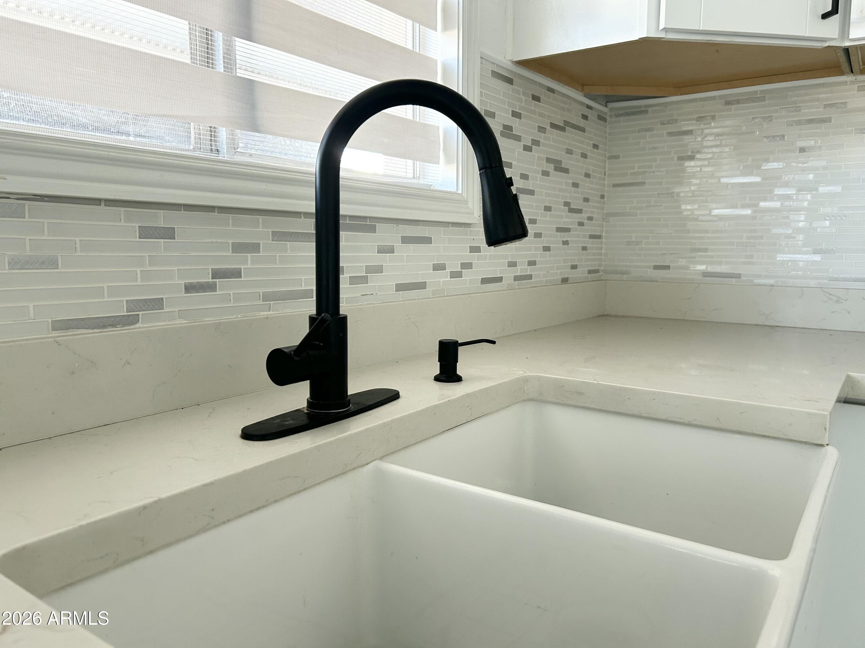 6565 North 19th Avenue, Unit 27 Phoenix, AZ 85015 - Photo 4 of 17 a bathroom with a sink