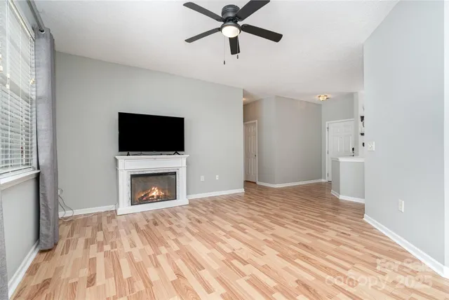 a bedroom with a bed and a fireplace