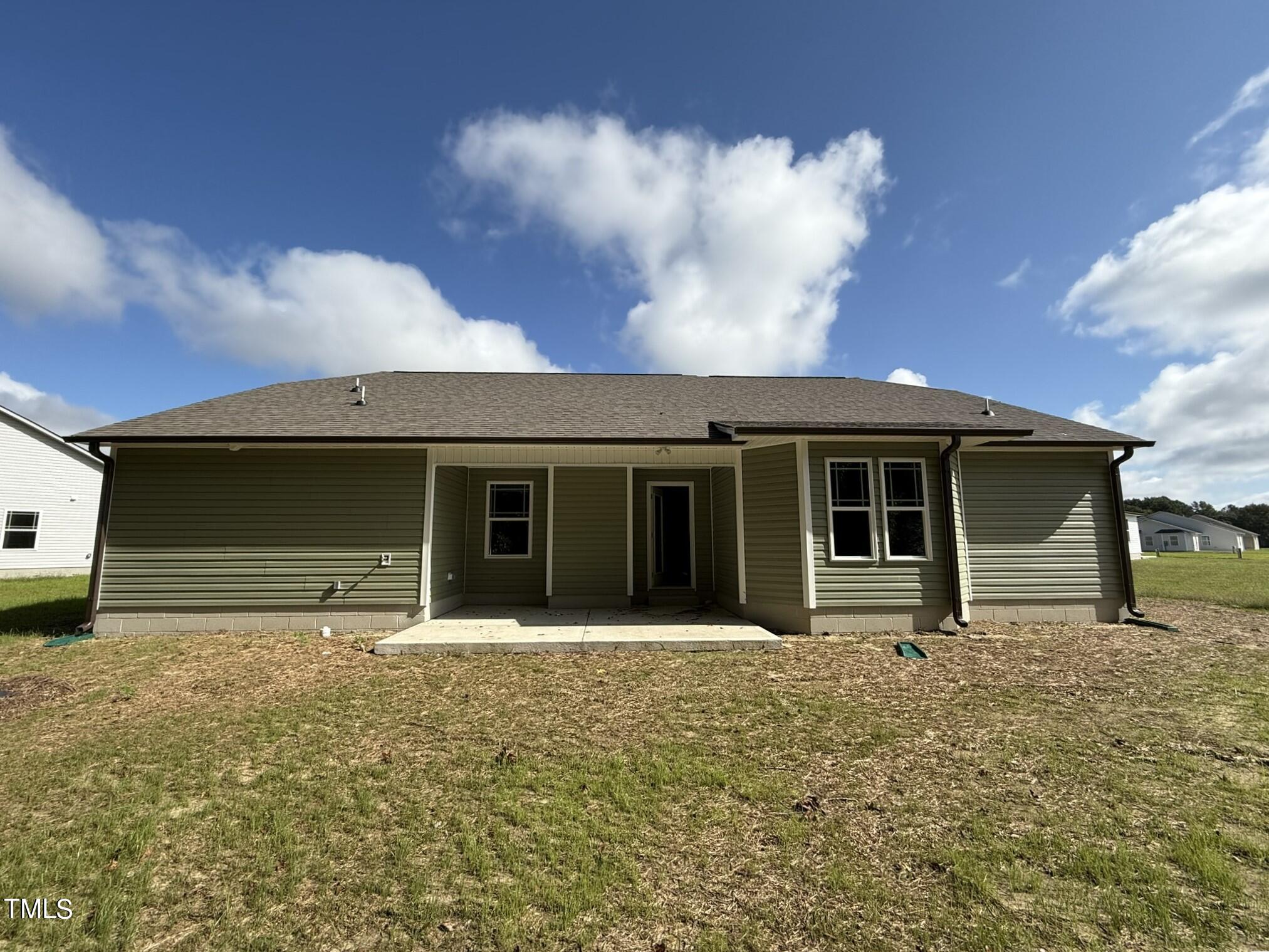 175 Grace Ridge Benson, NC 27504 - Photo 18 of 19 a front view of a house with garden