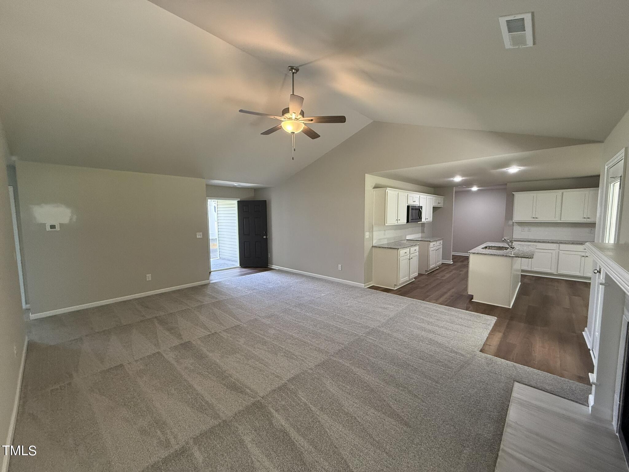 175 Grace Ridge Benson, NC 27504 - Photo 5 of 19 a view of an empty room with a window