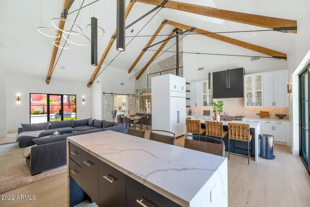 a bathroom with a double vanity sink mirror and