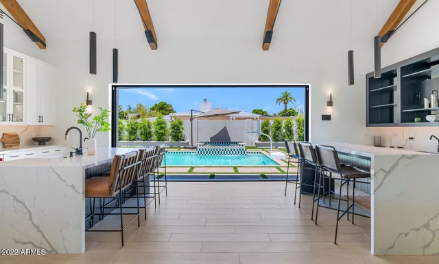 a view of a living room and dining room