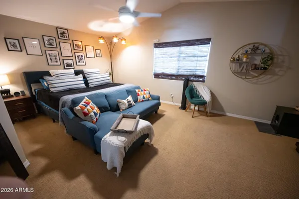 a living room with furniture and a window