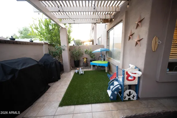 a gym area with lots of play table and chairs