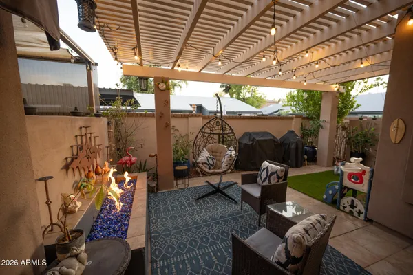 a view of a porch with furniture