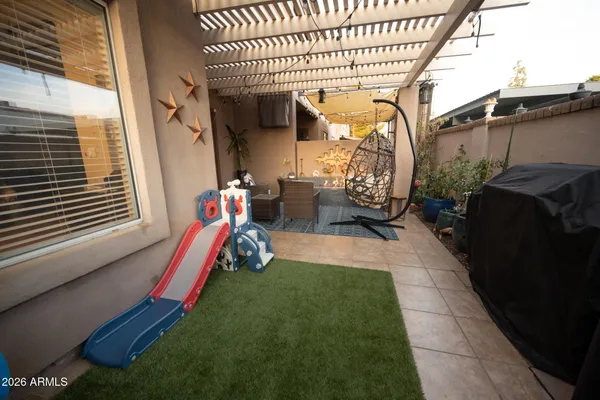 a view of a porch with furniture
