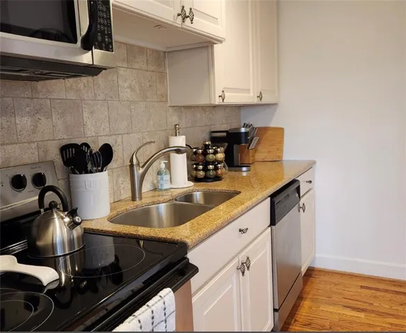 $100,000 | 323 Emanuel Cleaver II Blvd., Unit 6C, Kansas City, MO 64112