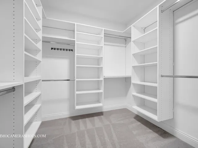 a view of an empty walk in closet