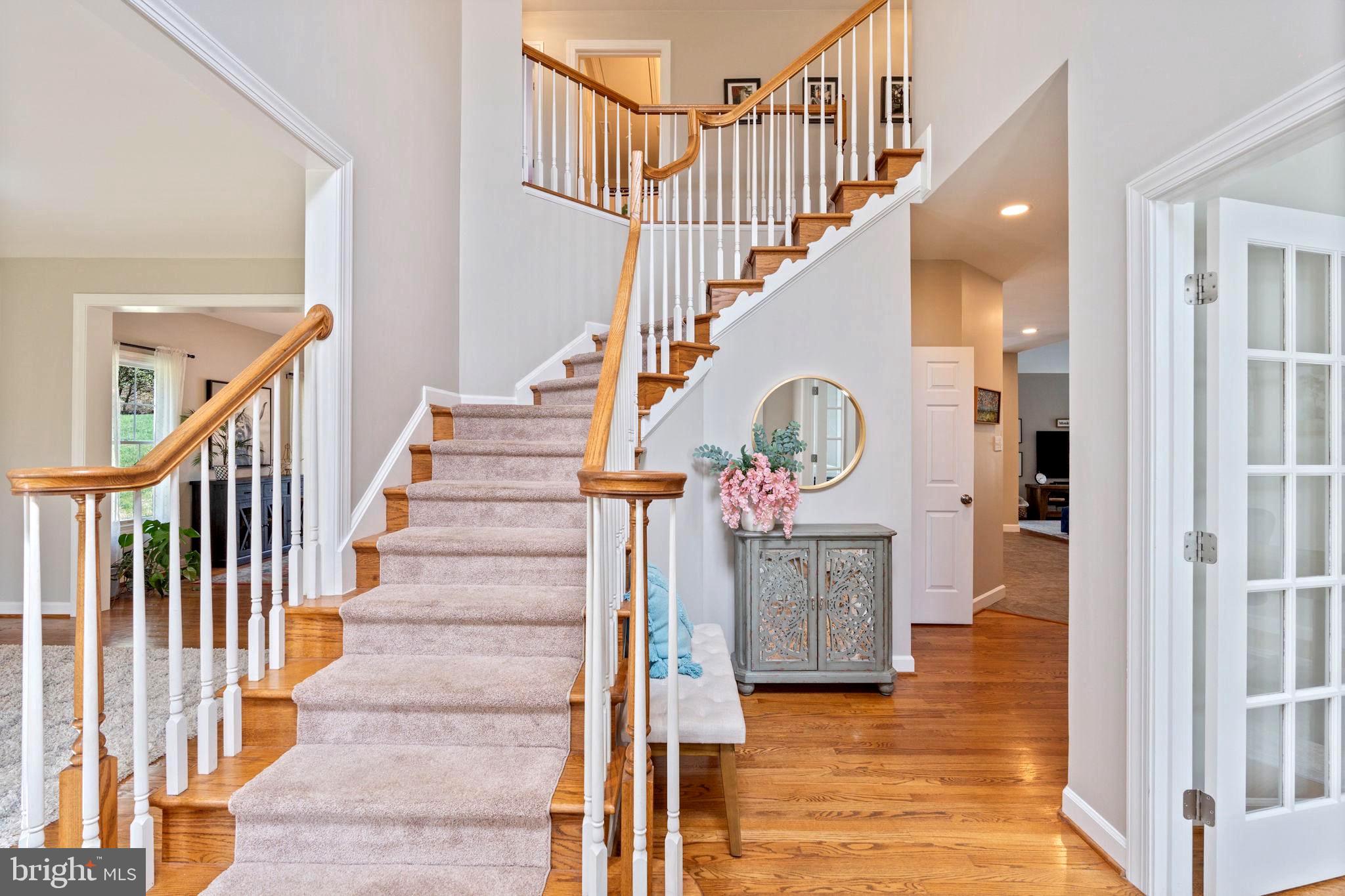 1231 Corbett Road Monkton, MD 21111 - Photo 4 of 84 Hardwood staircase with custom carpet runner