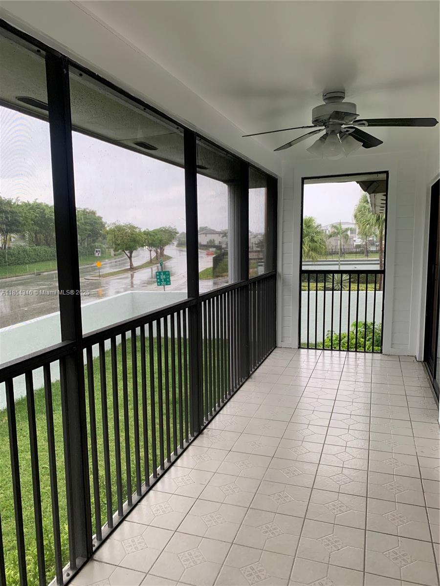 469 Northeast 207th Lane, Unit 207 Miami, FL 33179 - Photo 20 of 25 a view of a balcony