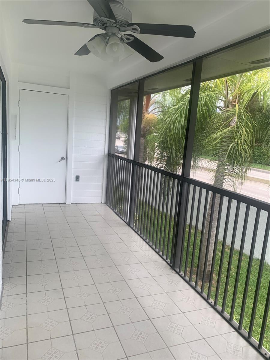 469 Northeast 207th Lane, Unit 207 Miami, FL 33179 - Photo 22 of 25 a view of a porch