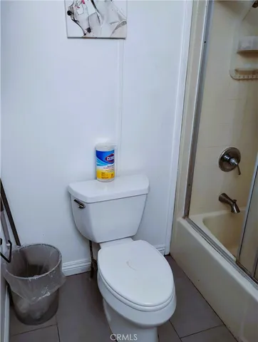 a bathroom with a toilet and a sink