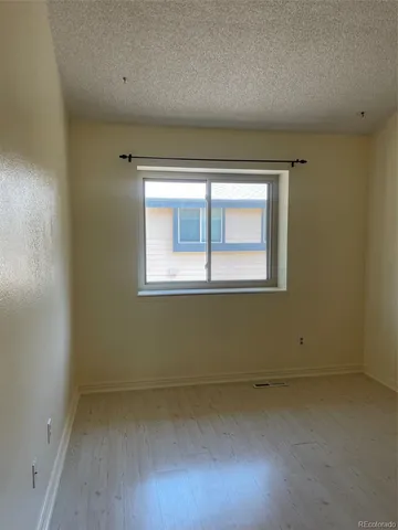 a view of door with wooden walls