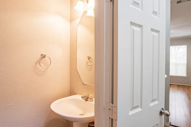 a bathroom with a toilet and a sink