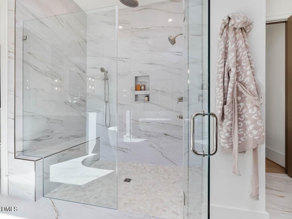 7013 Buckhead Drive Raleigh, NC 27615 - Photo 27 of 80 a bathroom with a shower and a sink