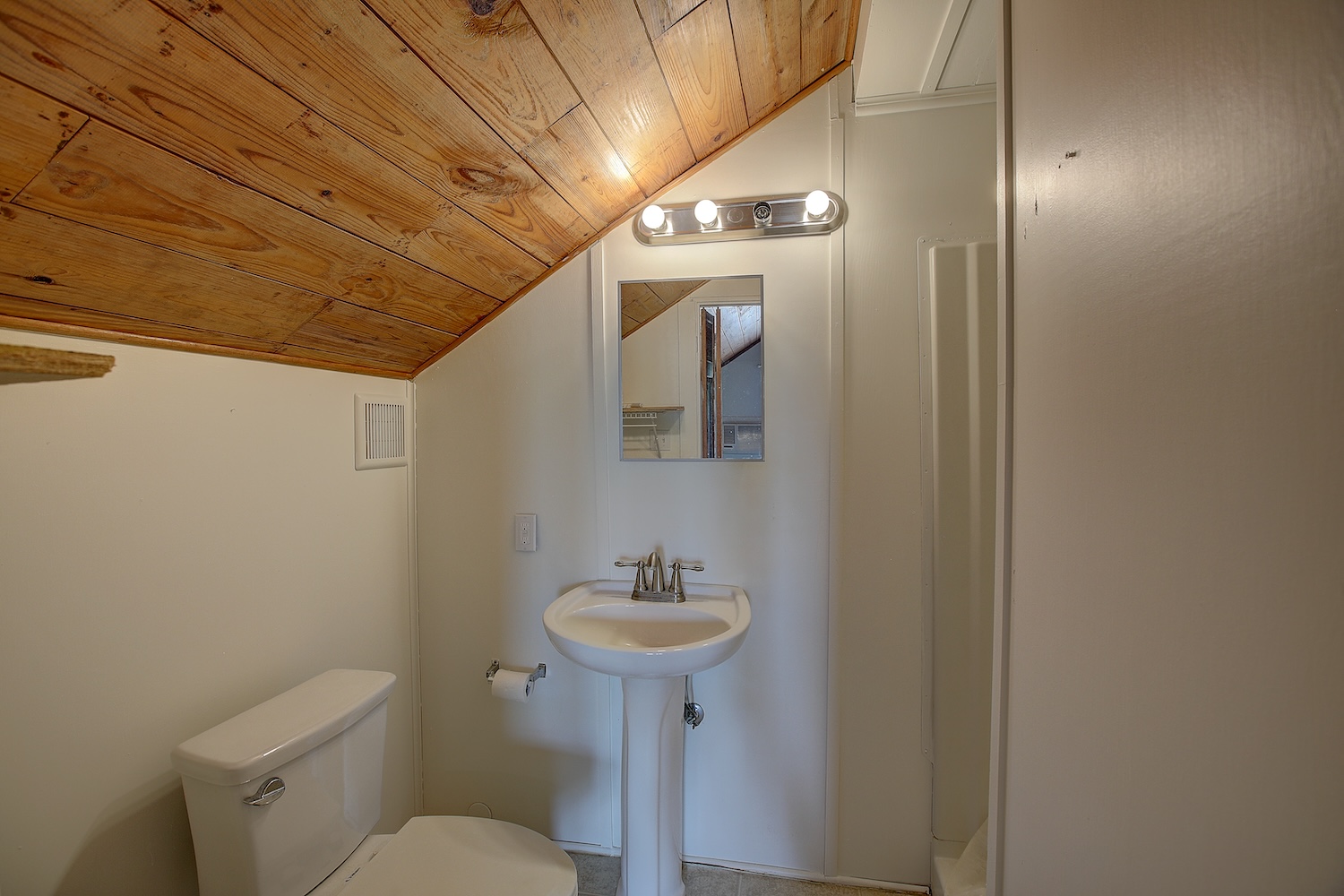 1708 Olive Street Georgetown, TX 78626 - Photo 26 of 40 a bathroom with a sink toilet and a mirror