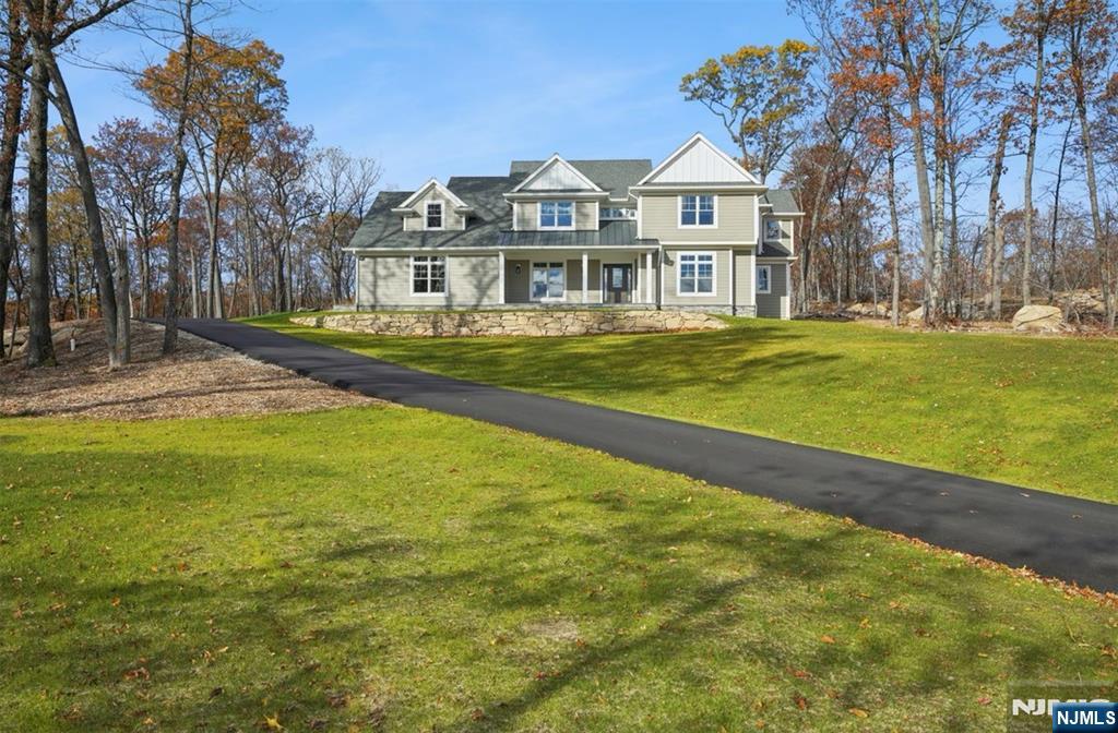 a front view of a house with swimming pool