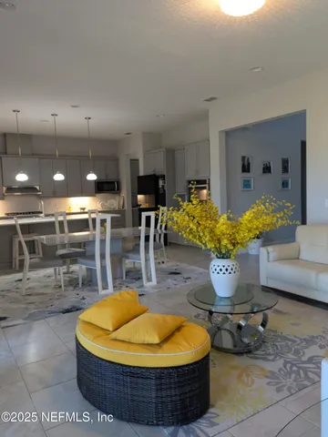 a outdoor space with lots of white furniture