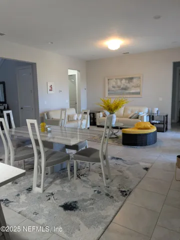 a living room with furniture and a couch