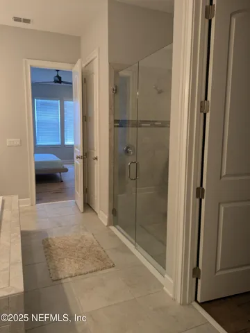 a close view of a shower in bathroom