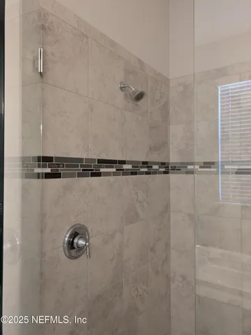 a kitchen with a stove and cabinets