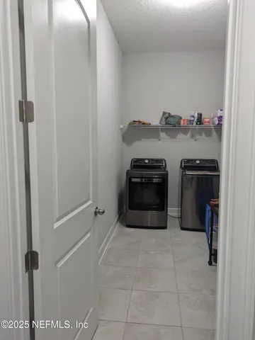 a view of a livingroom with furniture