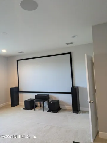 a bedroom with a bed and a table