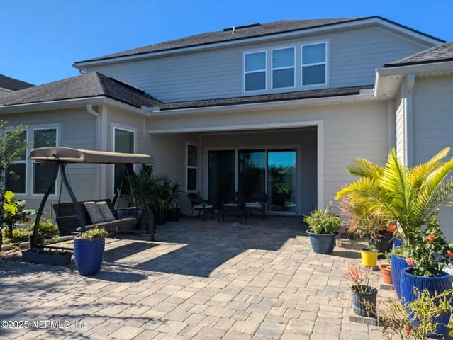 a view of a terrace with chairs