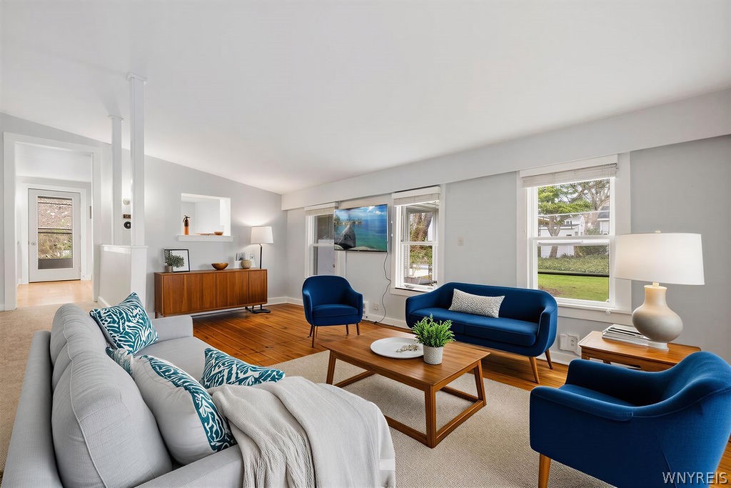 175 Niagara Street Lewiston, NY 14092 - Photo 4 of 33 Living room with original hardwood floors