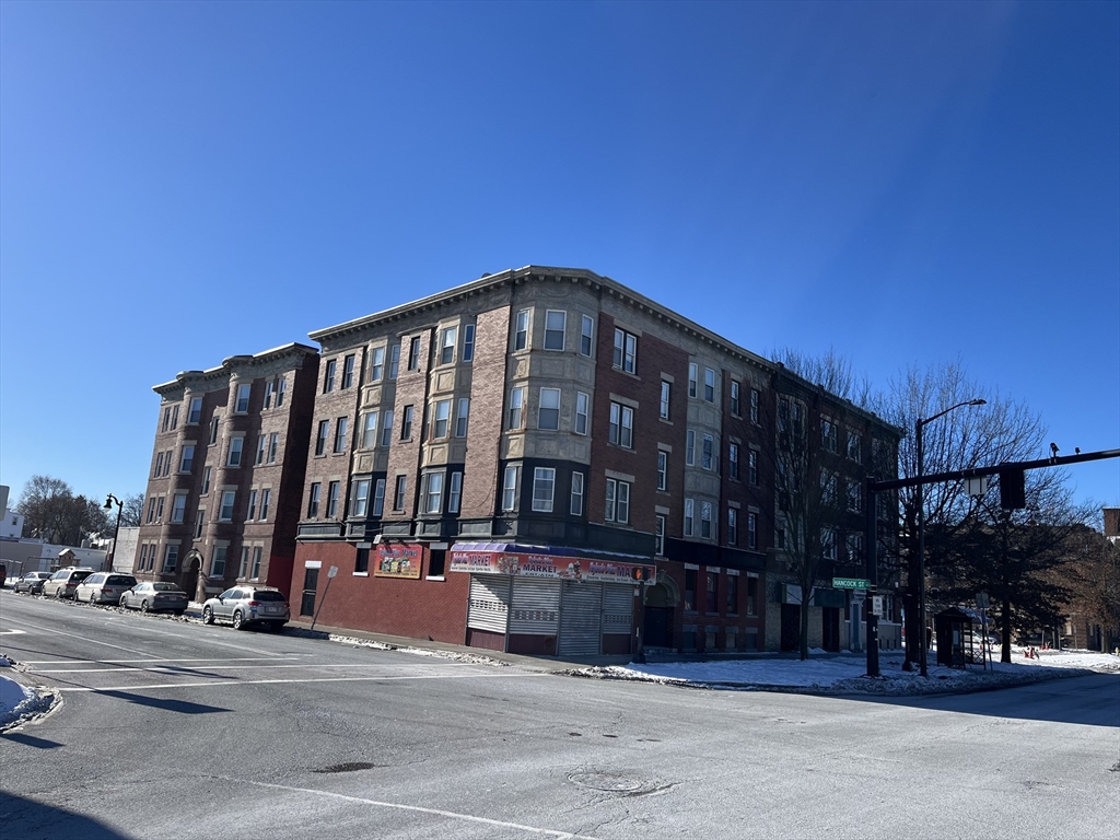 691 State Street Springfield, MA 01109 - Photo 1 of 18 a view of a tall building next to a road