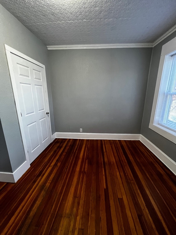 691 State Street Springfield, MA 01109 - Photo 13 of 18 a view of a room with wooden floor and window