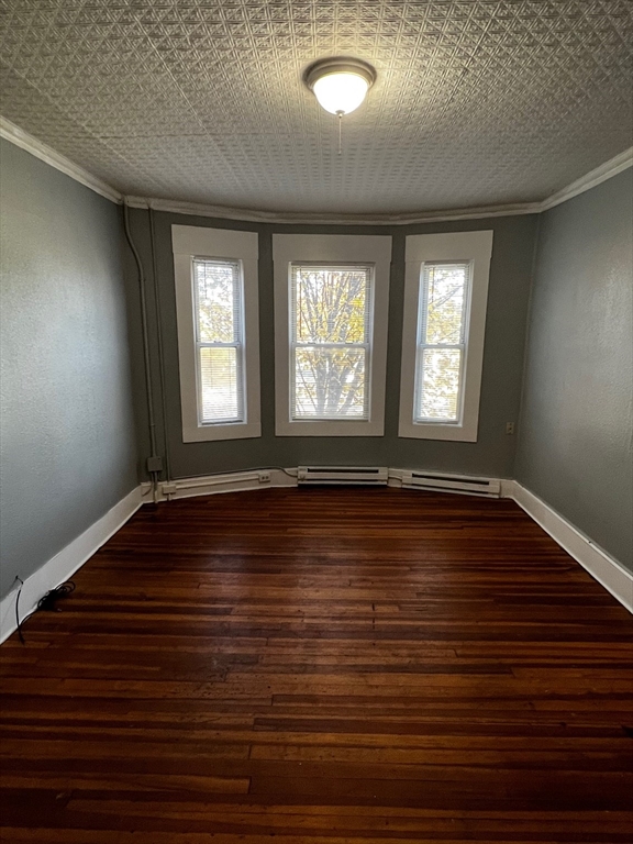 691 State Street Springfield, MA 01109 - Photo 18 of 18 a view of an empty room with wooden floor and a window