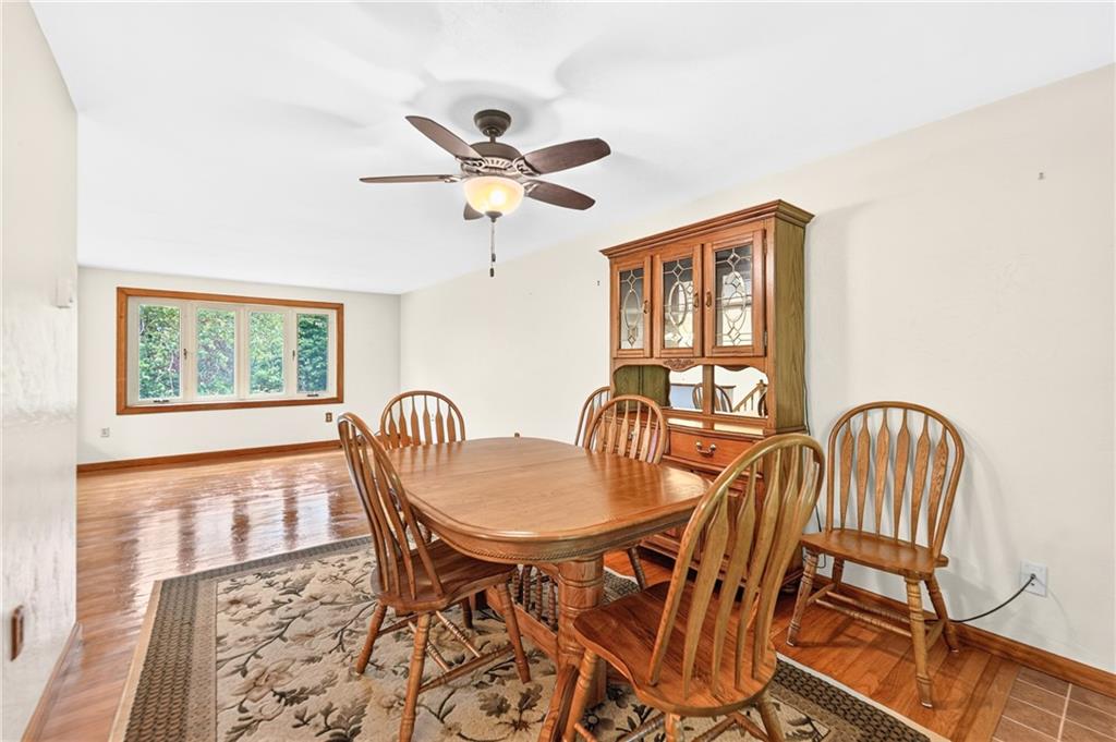 224 Bowman Road Bridgeville, PA 15017 - Photo 9 of 50 From the living room, you can flow right into the dining room. It's the perfect space for family and friends to gather and entertain!