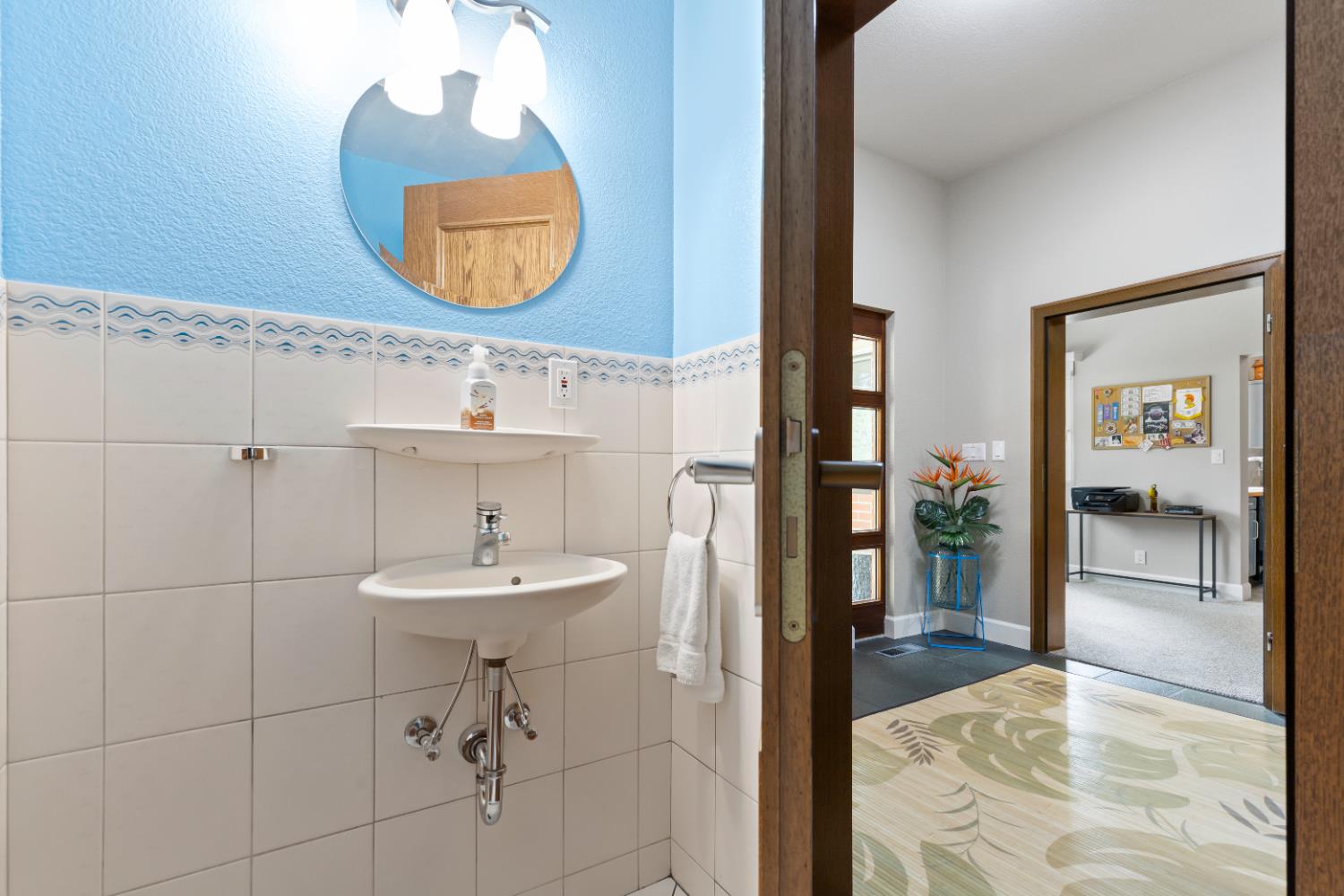 1222 Fruitvale Road Lincoln, CA 95648 - Photo 14 of 90 a bathroom with a sink a mirror and a shower