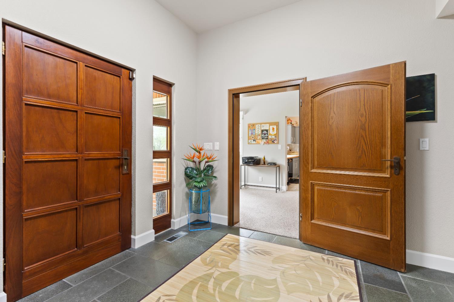 1222 Fruitvale Road Lincoln, CA 95648 - Photo 15 of 90 a view of a refrigerator in kitchen and an empty room