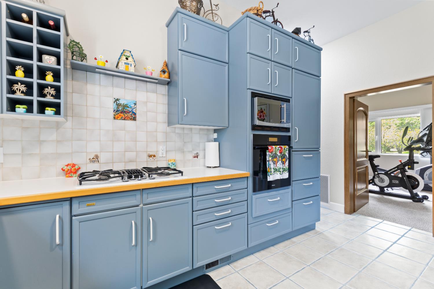 1222 Fruitvale Road Lincoln, CA 95648 - Photo 33 of 90 a kitchen with stainless steel appliances a cabinets and a living room view