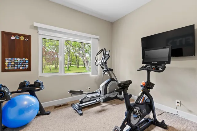 a view of a room with a large window