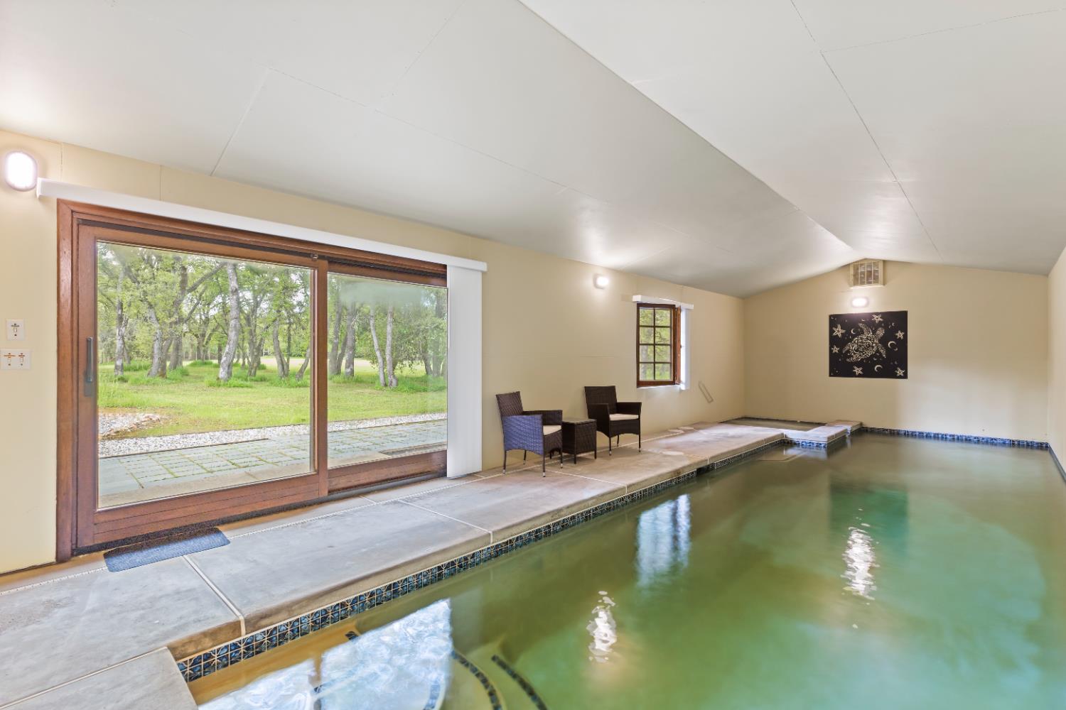 1222 Fruitvale Road Lincoln, CA 95648 - Photo 47 of 90 a living room with pool table and a floor to ceiling window