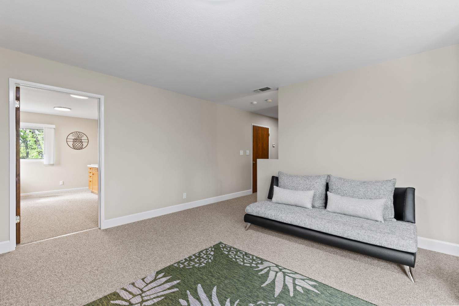 1222 Fruitvale Road Lincoln, CA 95648 - Photo 50 of 90 a bedroom with a bed and a lamp on table