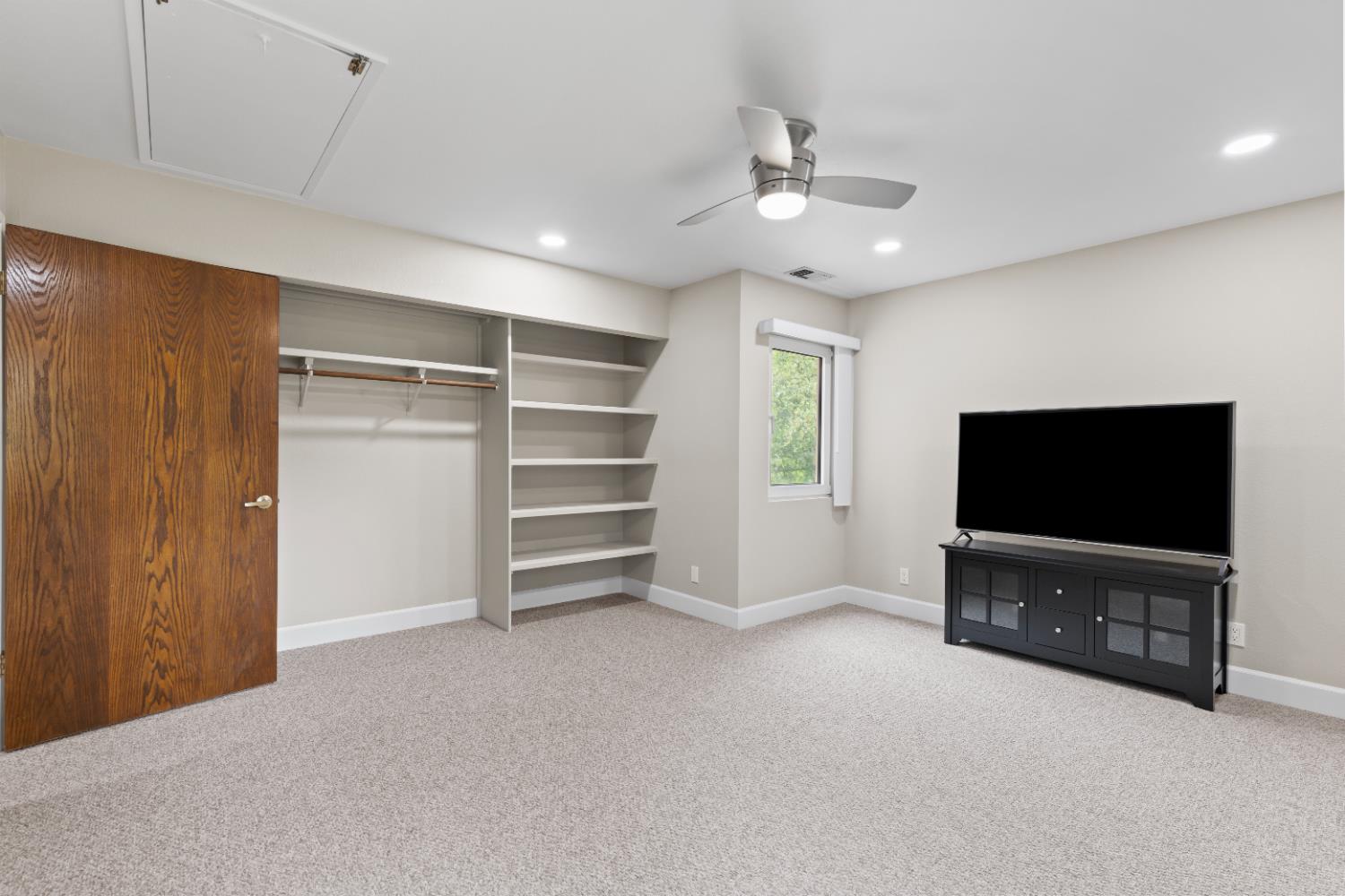 1222 Fruitvale Road Lincoln, CA 95648 - Photo 62 of 90 a view of an empty room with a fireplace and a window