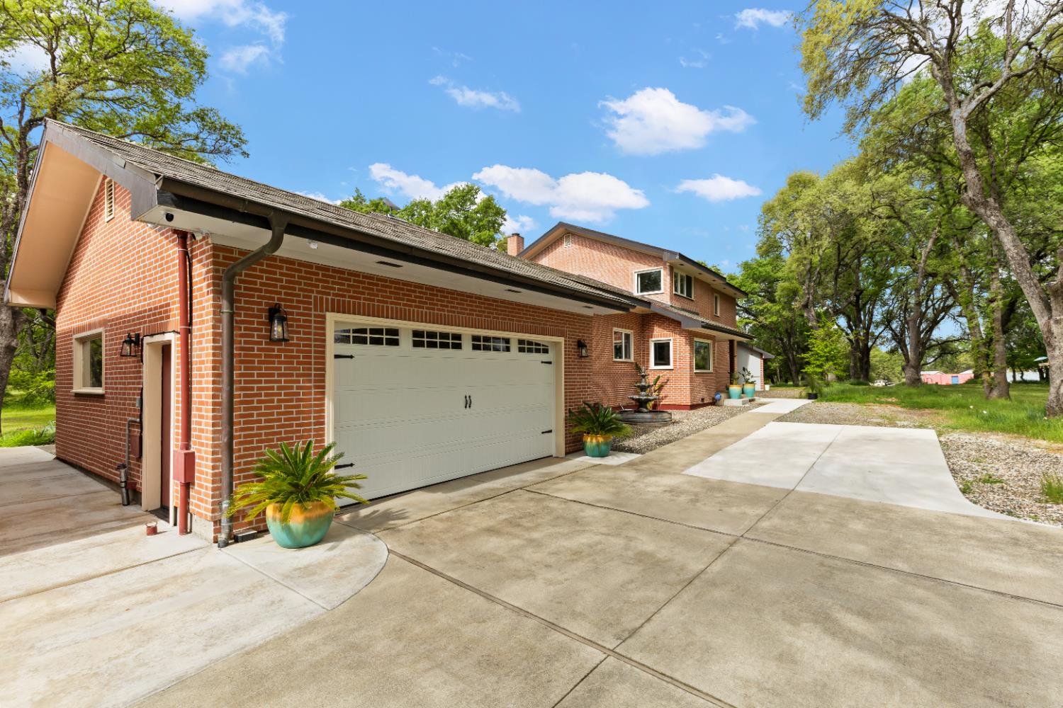 1222 Fruitvale Road Lincoln, CA 95648 - Photo 8 of 90 a front view of a house with a yard and garage