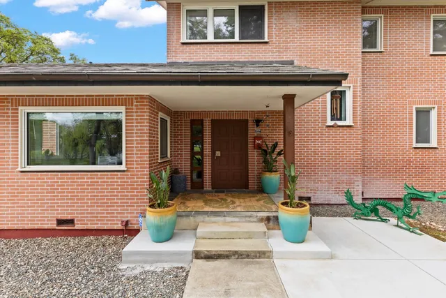 a bedroom with furniture and window