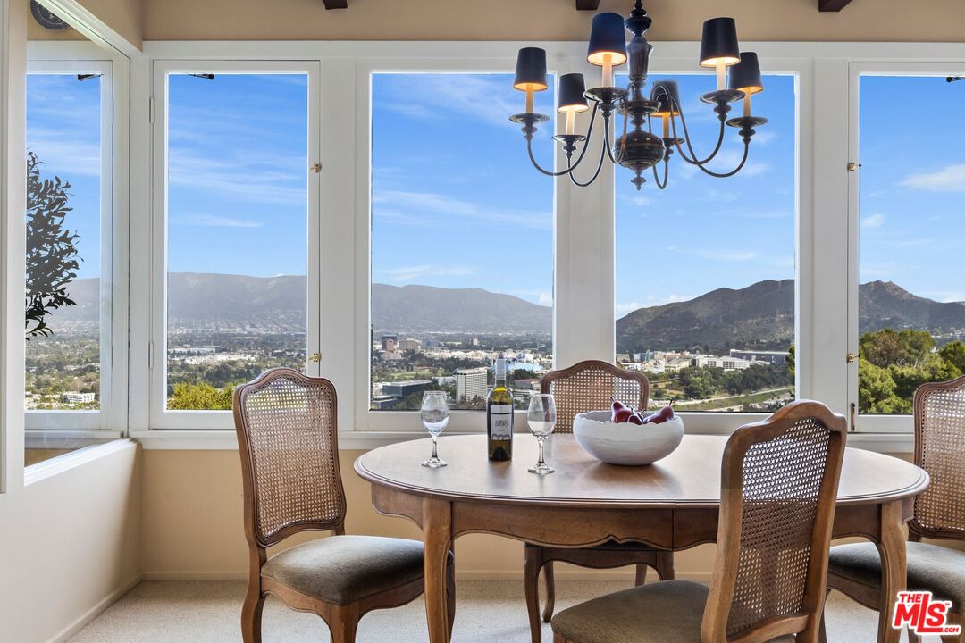 3230 Wrightwood Drive Studio City, CA 91604 - Photo 13 of 43 a view of a dining room with furniture window and outside view