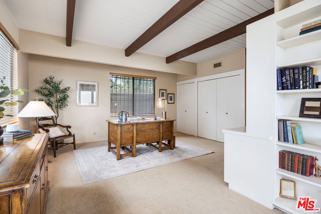 3230 Wrightwood Drive Studio City, CA 91604 - Photo 16 of 43 a living room with furniture and a book shelf